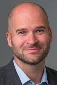 Law professor, OpenLaw co-founder, early Ethereum legal advisor